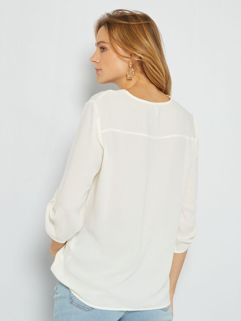 Blusa con de pico manga larga ajustable blanco - Kiabi -